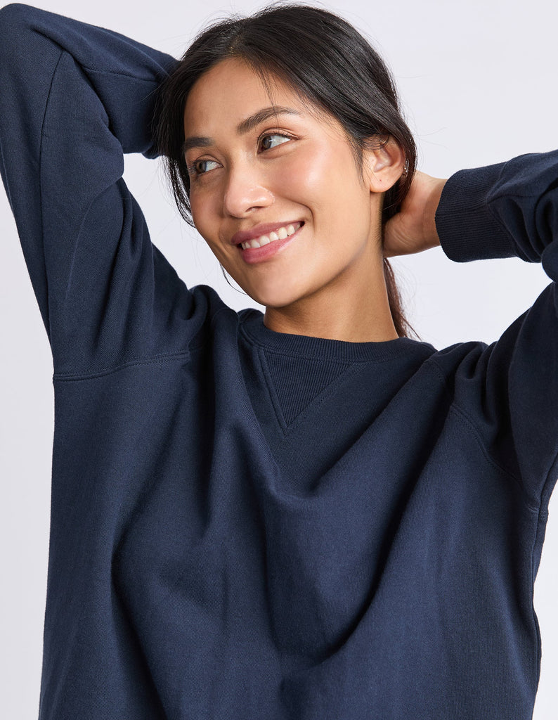 Melbourne crew - navy-Elm-Designed from a classic Elm Crew, the new Melbourne Crew will be your new go-to casual jumper for every day. Featuring a scooped crew neckline, dropped raglan sleeve and splits at the hem, this relaxed-fitting crew is comfortable and stylish. Raglan sleeves Crew neckline Hem splits Unbrushed cotton fleece 100% Cotton Model is wearing a size 10-Pash + Evolve