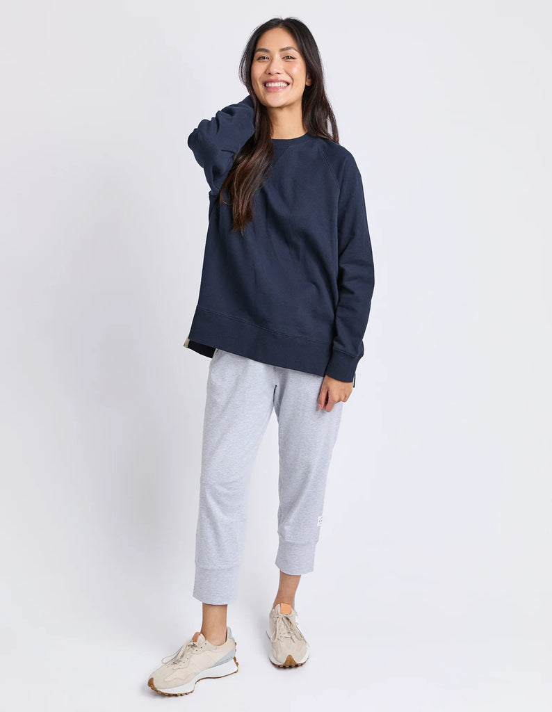 Melbourne crew - navy-Elm-Designed from a classic Elm Crew, the new Melbourne Crew will be your new go-to casual jumper for every day. Featuring a scooped crew neckline, dropped raglan sleeve and splits at the hem, this relaxed-fitting crew is comfortable and stylish. Raglan sleeves Crew neckline Hem splits Unbrushed cotton fleece 100% Cotton Model is wearing a size 10-Pash + Evolve