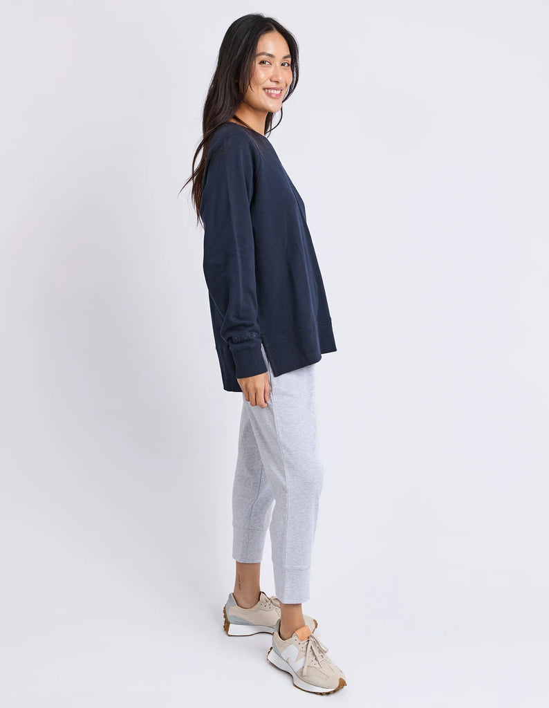 Melbourne crew - navy-Elm-Designed from a classic Elm Crew, the new Melbourne Crew will be your new go-to casual jumper for every day. Featuring a scooped crew neckline, dropped raglan sleeve and splits at the hem, this relaxed-fitting crew is comfortable and stylish. Raglan sleeves Crew neckline Hem splits Unbrushed cotton fleece 100% Cotton Model is wearing a size 10-Pash + Evolve