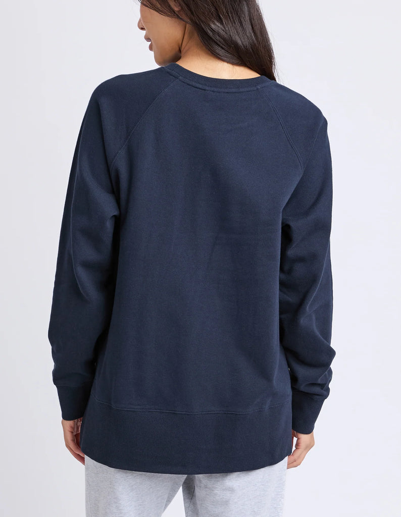 Melbourne crew - navy-Elm-Designed from a classic Elm Crew, the new Melbourne Crew will be your new go-to casual jumper for every day. Featuring a scooped crew neckline, dropped raglan sleeve and splits at the hem, this relaxed-fitting crew is comfortable and stylish. Raglan sleeves Crew neckline Hem splits Unbrushed cotton fleece 100% Cotton Model is wearing a size 10-Pash + Evolve