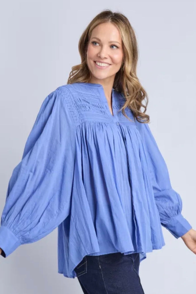 Montana blouse - cornflower-Elm-The Montana Blouse is a versatile wardrobe piece with an easy, relaxed feel that works beautifully layered or worn on its own. With easy button-front styling, it adds interest while still feeling effortless to wear. Crafted from 100% cotton, it delivers comfortable wear and easy versatility. Style it tucked into denim or relaxed pants for everyday wear, or layer it open over a tee and under outerwear for extra versatility. *Relaxed fit *Button down front *100% Cotton *Design