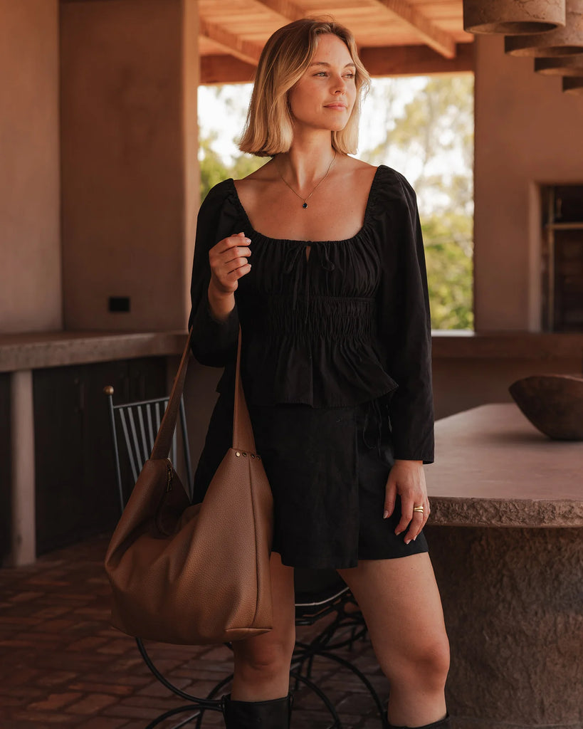 Morgan shoulder bag - caramel-Louenhide-The Louenhide Morgan Caramel Shoulder Bag brings a bold sense of ease to your everyday. With its slouchy, oversized silhouette and subtle studded detailing, this hobo shoulder bag makes a statement without trying too hard. Designed for the throw-and-go days, its laid-back shape pairs perfectly with lived-in denim, soft layers, and easy flowy dresses. Slung over your shoulder, the Morgan Caramel Shoulder Bag delivers effortless wearability and a softly structured finis