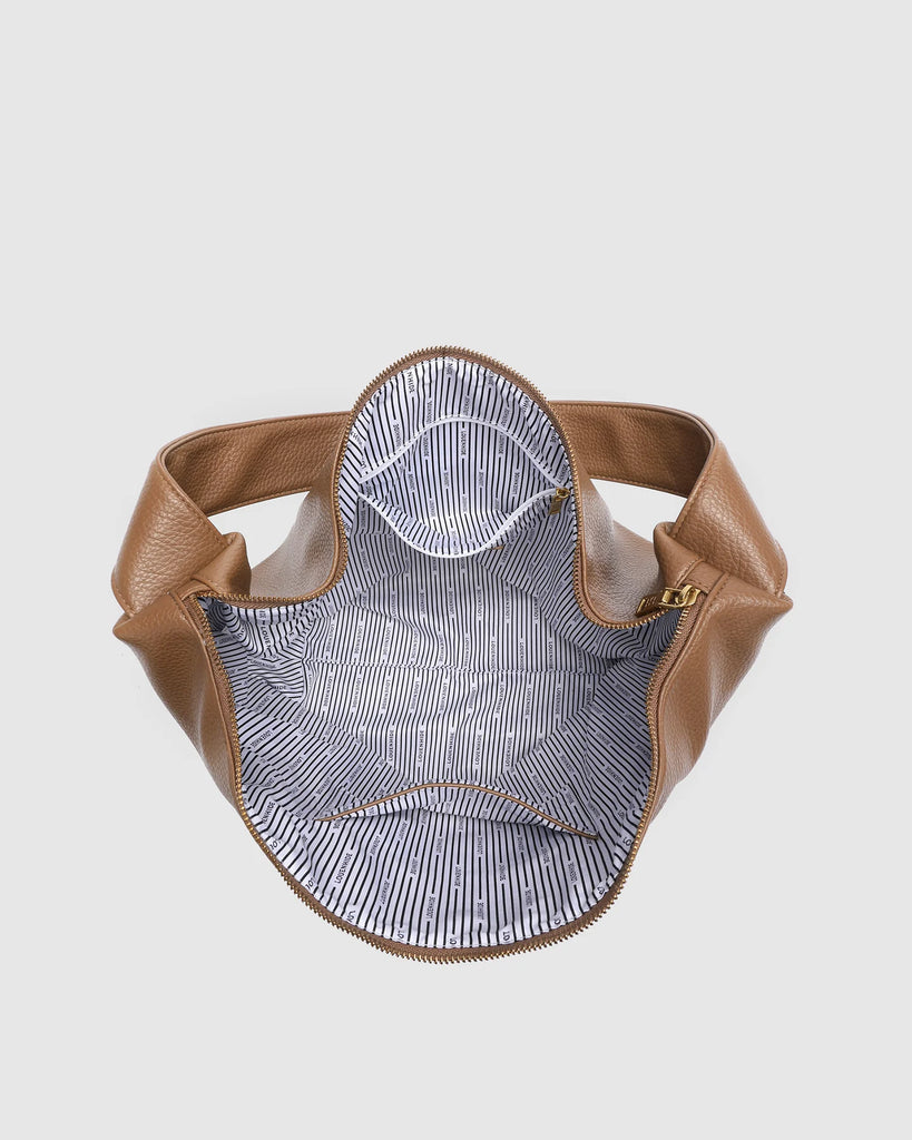 Morgan shoulder bag - caramel-Louenhide-The Louenhide Morgan Caramel Shoulder Bag brings a bold sense of ease to your everyday. With its slouchy, oversized silhouette and subtle studded detailing, this hobo shoulder bag makes a statement without trying too hard. Designed for the throw-and-go days, its laid-back shape pairs perfectly with lived-in denim, soft layers, and easy flowy dresses. Slung over your shoulder, the Morgan Caramel Shoulder Bag delivers effortless wearability and a softly structured finis