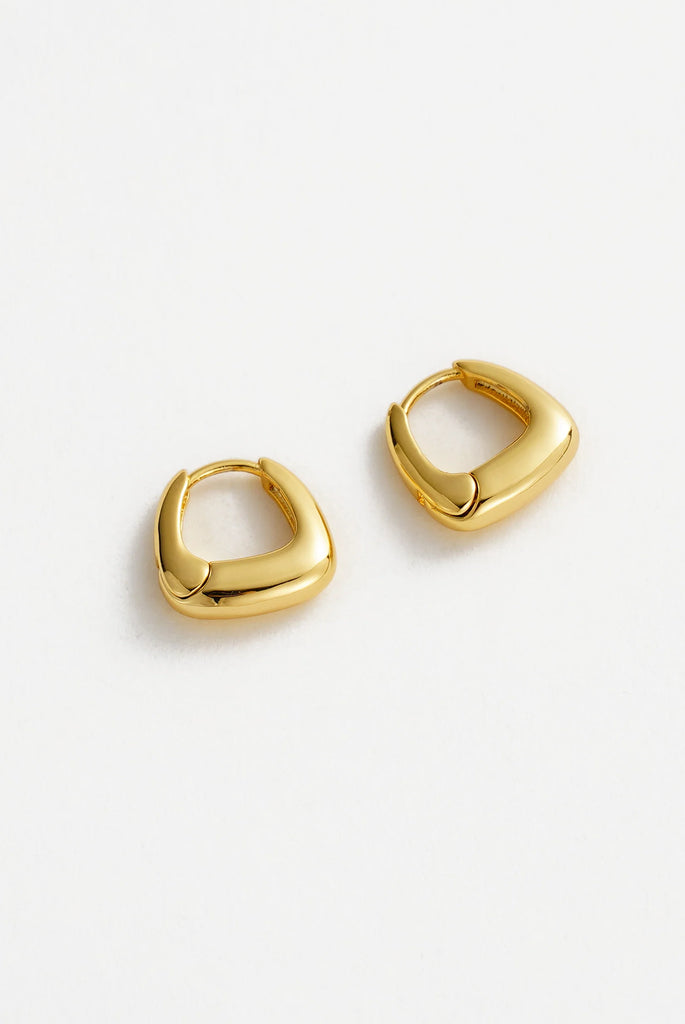 Neve huggy - Gold-Zafino-The Neve Huggie features a smooth curved design with a high-shine gold finish, making it a timeless everyday staple. Perfect for adding a touch of understated elegance to any look – wear solo or stack with your favourite hoops for a modern layered style. Metal: 18K Gold Plated on BrassDimensions: 8mm HoopWater Resistant: Splash proof, not recommended to be worn in the ocean or pool Water resistant Hypoallergenic & Nickel Free Female Founded & Family Owned-Pash + Evolve