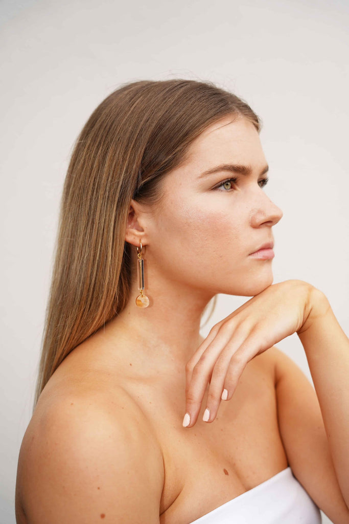 Nova earrings - sunset-Hagen + Co-A simply stunning, contemporary earring. Gorgeous clear glass tube bead with beautiful sunset marbled acrylic disc. Hanging from a sweet, wee huggie hoop. *Materials: Acrylic, glass beads *Nickel Free earring hoops *Light weight and easy to wear. *Hoop: 15mm *Earring: 13mm x 55mm-Pash + Evolve