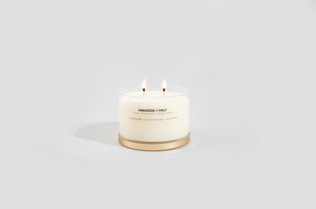 Oakwood & Malt soy candle-Pash + Evolve-Exuding boldness and sophistication with notes of oak wood, sandalwood, patchouli, clove bud and just a hint of jasmine. Envelope yourself in the woody and malted undertones of this luxuriously-scented soy candle. Blending top notes of oakwood, sandalwood and malted vanilla with earthy clove bud and jasmine, this exquisite candle is housed in our stylish Golden Girl Collection for a timelessly sophisticated look. Our newest scent is one of my absolute fave limited edi