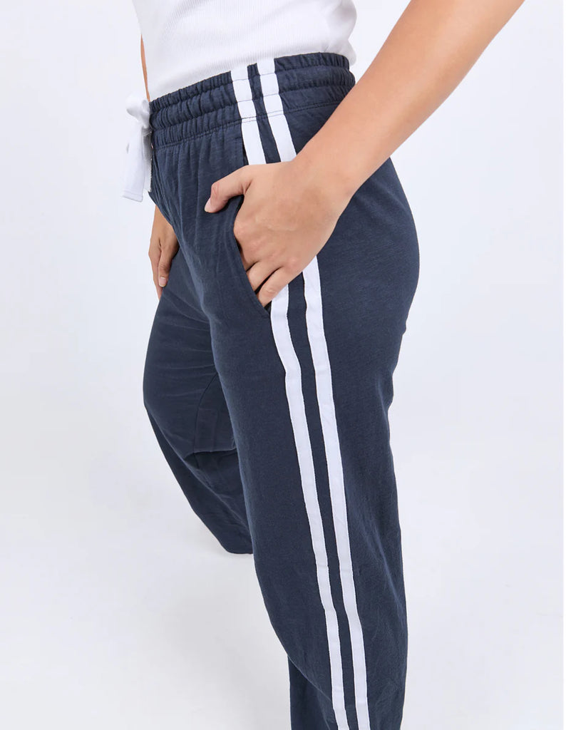 Power Pant - Navy-Foxwood-Power through your day in the new Power Pants from LeisureFit. Featuring on-trend side taping, a wide elastic waist with drawcord and pockets, these 100% lightweight cotton pants truly elevate your casual style this season. Elastic waist with drawcord Side taping detail Relaxed fit 100% Cotton Model is wearing a size 10-Pash + Evolve