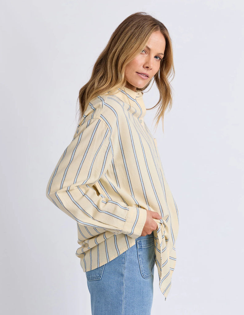Sadie shirt - lemon/light blue stripe-Foxwood-Bright, breezy, and made for easy days—the Sadie Shirt brings a fresh pop of colour with its playful stripe and relaxed feel. The longer-line fit and chest pocket keep it laid-back, while the button-up front makes it easy to style your way. Perfect for throwing on and heading out, no overthinking required. Front button opening Chest pocket Longer line fit 56% Cotton 44% Viscose Our model is 176cm and wears Size 10-Pash + Evolve