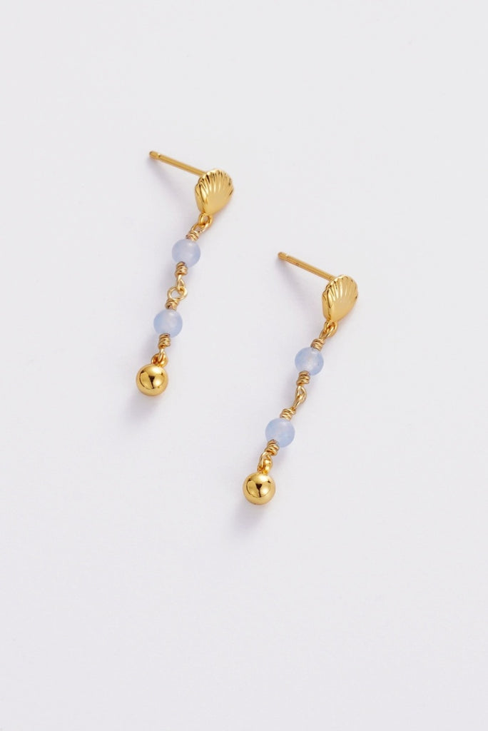 Shelly drop earring - gold-Zarla-A delicate drop earring finished with a sculpted shell detail and soft tonal accents. Light-catching and full of movement, it brings a gentle, coastal feel to your look. Feminine, effortless, and designed for everyday wear. *18K Gold Plated Solid Brass Base *Water proof: Can be worn in the ocean or pool-Pash + Evolve
