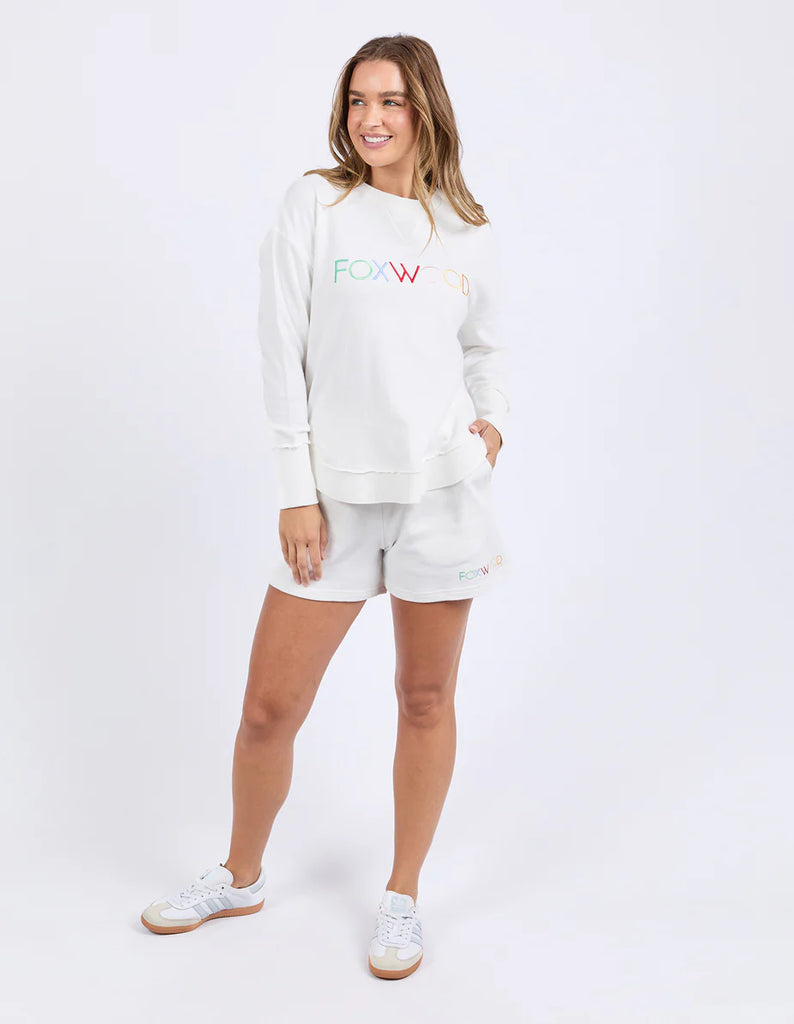 Simplified Confetti Crew - Vintage White-Foxwood-Say hello to your new feel-good fave. The Simplified Confetti Crew brings all the comfort with a playful twist. With multicoloured embroidery on the chest, raw edge details, and a curved hem that flatters every fit, it's the kind of piece you'll want to wear on repeat. Easy to throw on, even easier to love. One colour just won’t be enough. Front chest multicoloured embroidery Raw edge detail Curved hem 100% Cotton Model is wearing a size 10-Pash + Evolve