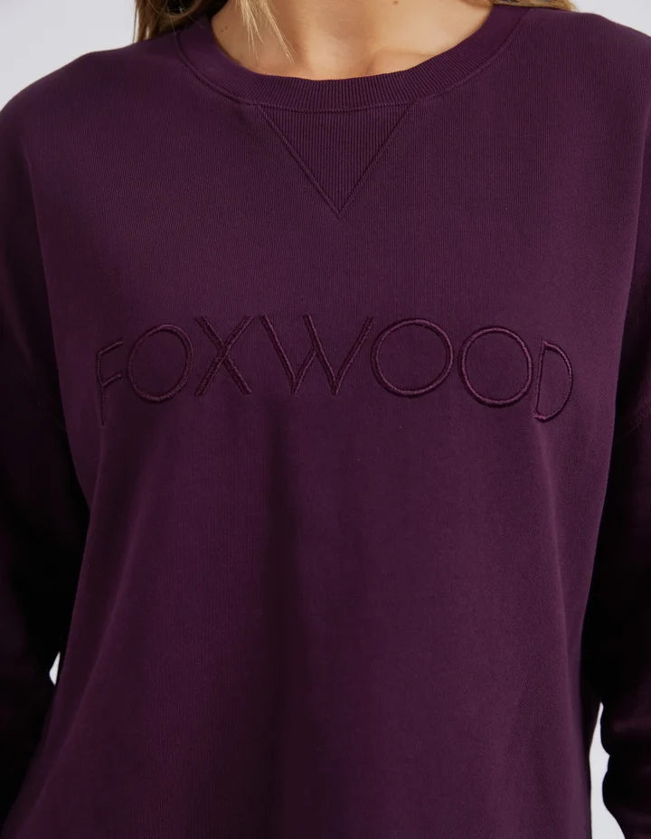 Simplified Crew - Plum-Foxwood-The Simplified Crew is the perfect throw over for your everyday wardrobe. With its round neck, hi-lo hemline, side splits with raw edging & the classic Foxwood logo, you are going to want one in every colour. Front chest embroidery Raw edge detail Curved hem 100% Cotton Our model is 176cm and wears Size 10-Pash + Evolve