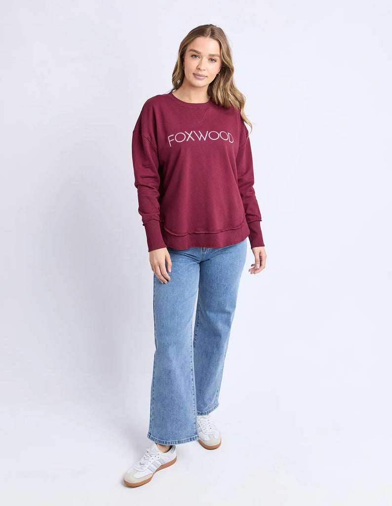 Simplified Metallic Crew - Port-Foxwood-The Bling version of our Best Selling Simplified Crew. This crew is the perfect throw over for your everyday wardrobe. With its round neck, hi-lo hemline, side splits with raw edging & the classic Foxwood logo, you are going to want one in every colour. The Metallic Crew has a stunning lurex thread run through the Foxwood embroidery for that little bit 'extra'. Front chest embroidery Raw edge detail Curved hem 100% Cotton Our model is 176cm and wears Size 10-Pash + Ev