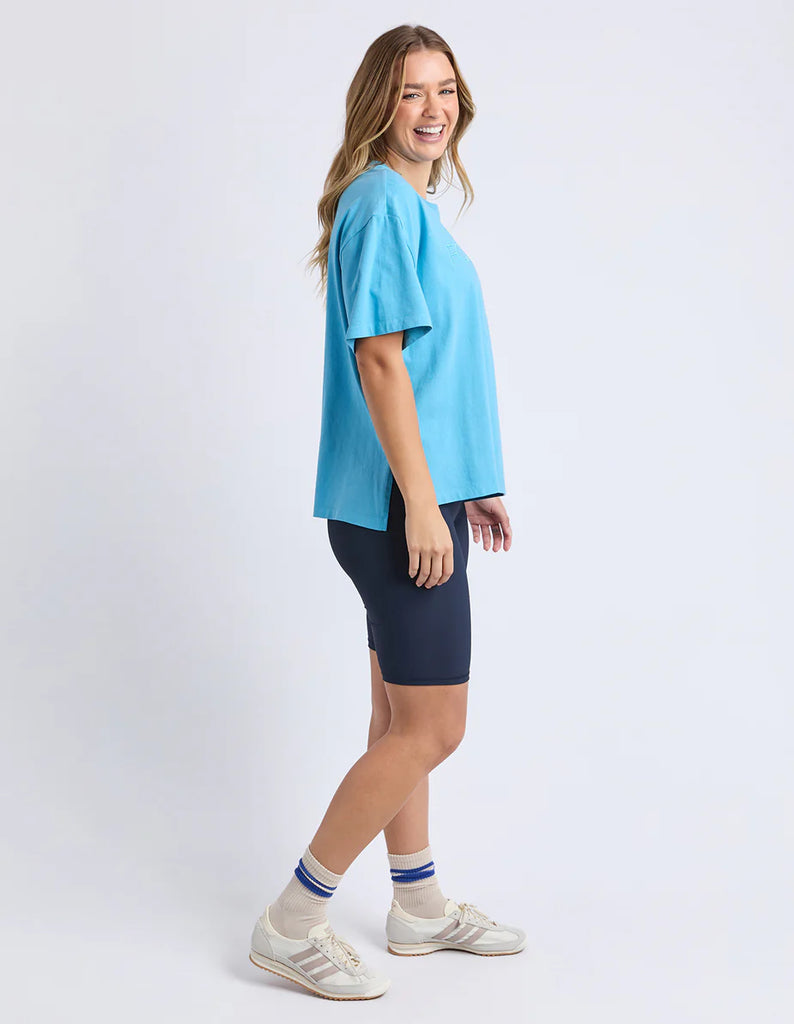 Simplified Tee - Sky-Foxwood-The Simplified Tee is the perfect throw over for your everyday wardrobe. With its round neck, hi-lo hemline, side splits with raw edging & the classic Foxwood logo, you are going to want one in every colour. Front chest embroidery Round neckline Relaxed fit 100% Cotton Our model is 176cm and wears Size 10-Pash + Evolve