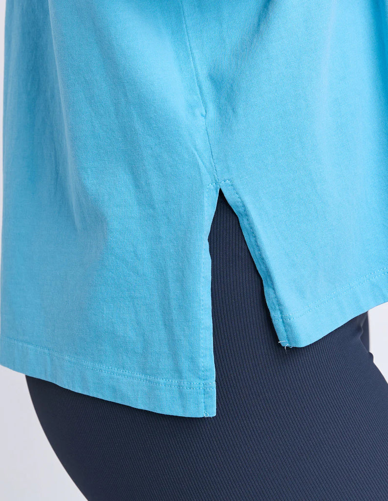 Simplified Tee - Sky-Foxwood-The Simplified Tee is the perfect throw over for your everyday wardrobe. With its round neck, hi-lo hemline, side splits with raw edging & the classic Foxwood logo, you are going to want one in every colour. Front chest embroidery Round neckline Relaxed fit 100% Cotton Our model is 176cm and wears Size 10-Pash + Evolve