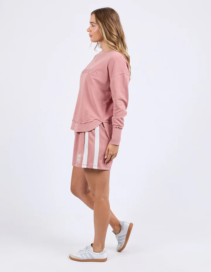 Simplified crew - dusty rose-Foxwood-The Simplified Crew is the perfect throw over for your everyday wardrobe. With its round neck, hi-lo hemline, side splits with raw edging & the classic Foxwood logo, you are going to want one in every colour. Front chest embroidery Raw edge detail Curved hem 100% Cotton Model is wearing size 10-Pash + Evolve