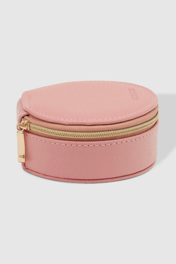 Sisco jewellery box - pink-Louenhide-The Louenhide Sisco Pink Jewellery box is a gorgeous travel case ideal for storing your precious gems. Organise your essential items easily with three ring rolls, two compartments, an elasticated slip pocket and a press stud tab for earrings. Structured and protected, this affordable jewellery case will be your new travel companion. Internal Features 3 Ring Rolls, Press Stud Earring Band, Elastic Slip Pocket, 2 Compartments Internal Lining Faux Suede Pink 100% Lining Clo