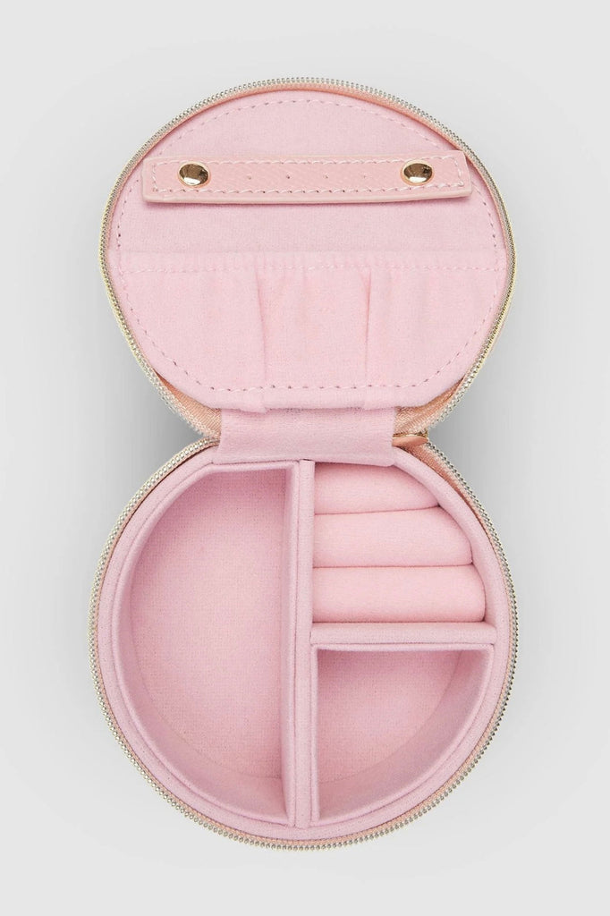Sisco jewellery box - pink-Louenhide-The Louenhide Sisco Pink Jewellery box is a gorgeous travel case ideal for storing your precious gems. Organise your essential items easily with three ring rolls, two compartments, an elasticated slip pocket and a press stud tab for earrings. Structured and protected, this affordable jewellery case will be your new travel companion. Internal Features 3 Ring Rolls, Press Stud Earring Band, Elastic Slip Pocket, 2 Compartments Internal Lining Faux Suede Pink 100% Lining Clo