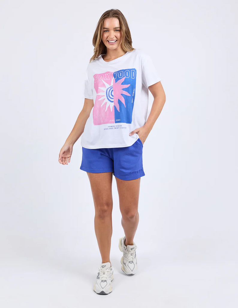 Solar Tee - White-Foxwood-Turn up the colour in this bold oversized tee. Featuring a bright exclusive print, classic round neckline, and a relaxed oversized fit, it’s made for easy days with maximum style. Just throw it on and go loud. Foxwood exclusive front chest print Round neckline Oversized fit 100% Cotton Model is wearing a size 10-Pash + Evolve