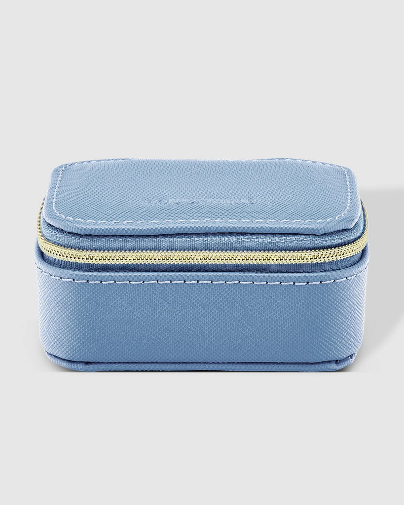 Suzie Jewellery Box - Cloudy Blue-Louenhide-The Louenhide Suzie Cloudy Blue Jewellery Box is a sweet travel companion ready to store all of your rings, necklaces, bracelets, and earrings. Use every day and stow in your bag for on-the-go use, or pack for weekend adventures. Featuring three ring rolls, two compartments, and an elasticated slip pocket, your precious gems will be secured safely. Internal Features 2 Ring Rolls, Elastic Slip Pocket, 2 Compartments Internal Lining Faux Suede 100% Lining Closure Se