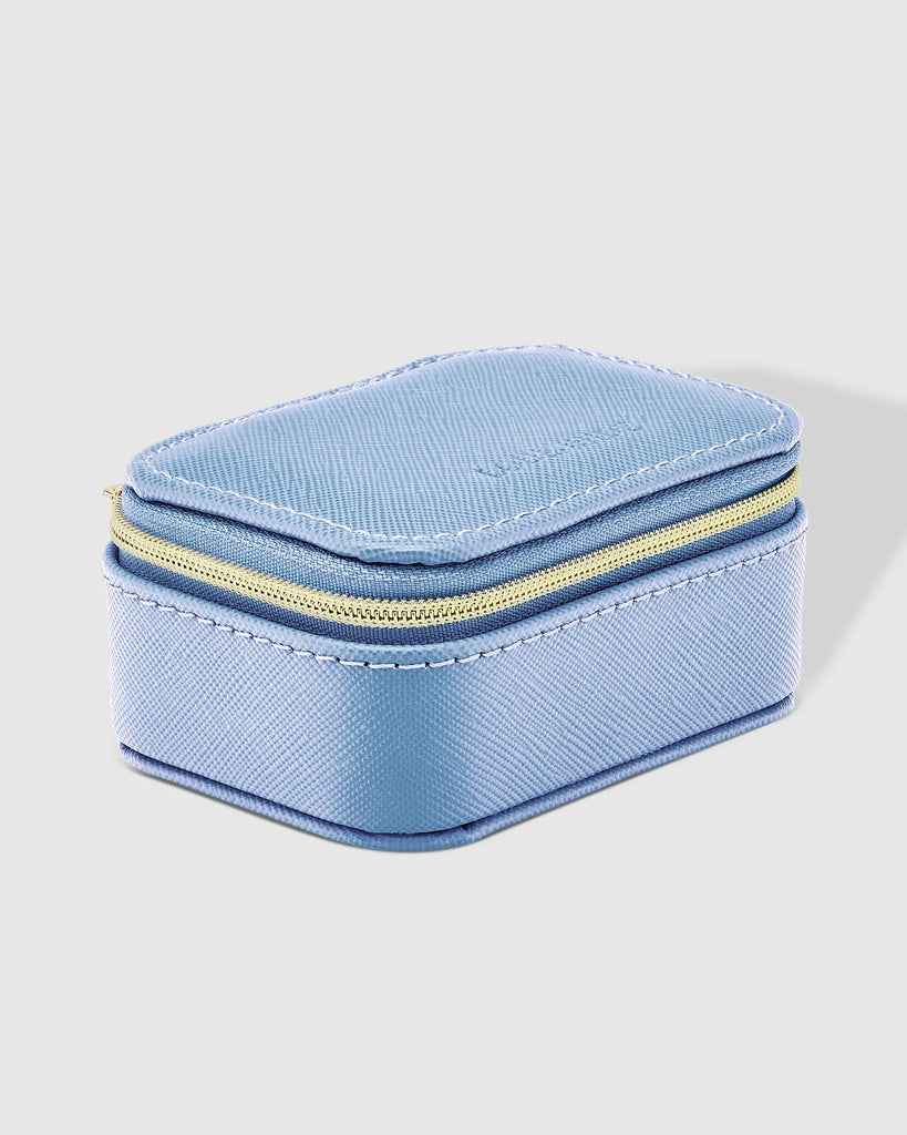 Suzie Jewellery Box - Cloudy Blue-Louenhide-The Louenhide Suzie Cloudy Blue Jewellery Box is a sweet travel companion ready to store all of your rings, necklaces, bracelets, and earrings. Use every day and stow in your bag for on-the-go use, or pack for weekend adventures. Featuring three ring rolls, two compartments, and an elasticated slip pocket, your precious gems will be secured safely. Internal Features 2 Ring Rolls, Elastic Slip Pocket, 2 Compartments Internal Lining Faux Suede 100% Lining Closure Se