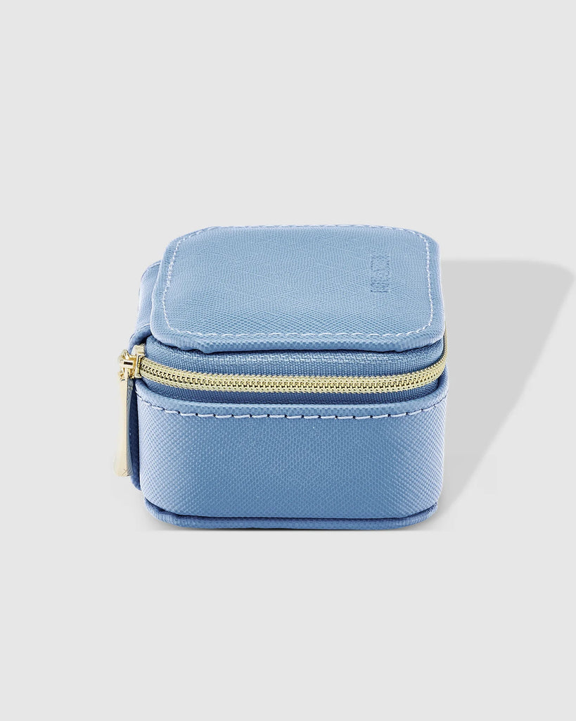 Suzie Jewellery Box - Cloudy Blue-Louenhide-The Louenhide Suzie Cloudy Blue Jewellery Box is a sweet travel companion ready to store all of your rings, necklaces, bracelets, and earrings. Use every day and stow in your bag for on-the-go use, or pack for weekend adventures. Featuring three ring rolls, two compartments, and an elasticated slip pocket, your precious gems will be secured safely. Internal Features 2 Ring Rolls, Elastic Slip Pocket, 2 Compartments Internal Lining Faux Suede 100% Lining Closure Se