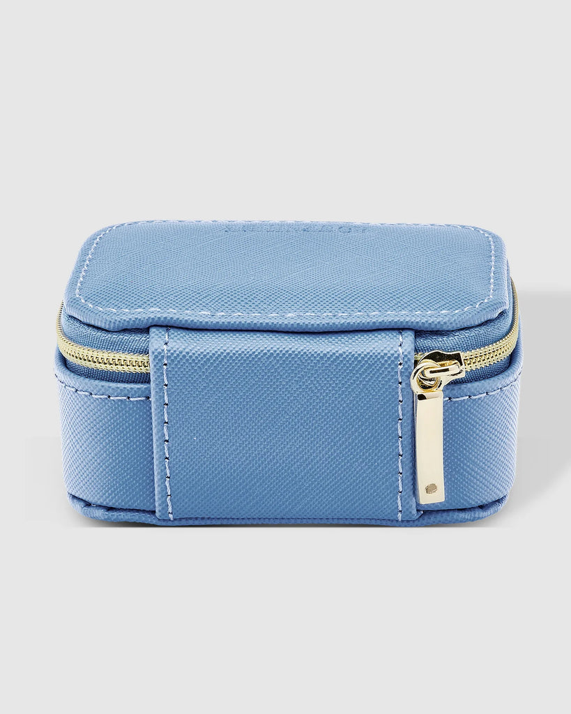 Suzie Jewellery Box - Cloudy Blue-Louenhide-The Louenhide Suzie Cloudy Blue Jewellery Box is a sweet travel companion ready to store all of your rings, necklaces, bracelets, and earrings. Use every day and stow in your bag for on-the-go use, or pack for weekend adventures. Featuring three ring rolls, two compartments, and an elasticated slip pocket, your precious gems will be secured safely. Internal Features 2 Ring Rolls, Elastic Slip Pocket, 2 Compartments Internal Lining Faux Suede 100% Lining Closure Se