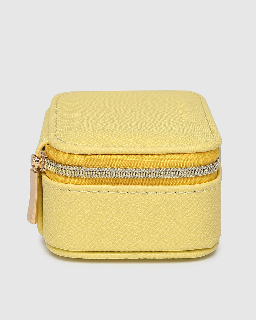 Suzie Jewellery Box - Lemon-Louenhide-The Louenhide Suzie Lemon Jewellery Box is a sweet travel companion ready to store all of your rings, necklaces, bracelets, and earrings. Use every day and stow in your bag for on-the-go use, or pack for weekend adventures. Featuring three ring rolls, two compartments, and an elasticated slip pocket, your precious gems will be secured safely. Internal Features 2 Ring Rolls, Elastic Slip Pocket, 2 Compartments Internal Lining Faux Suede 100% Lining Closure Secure Zip Bod