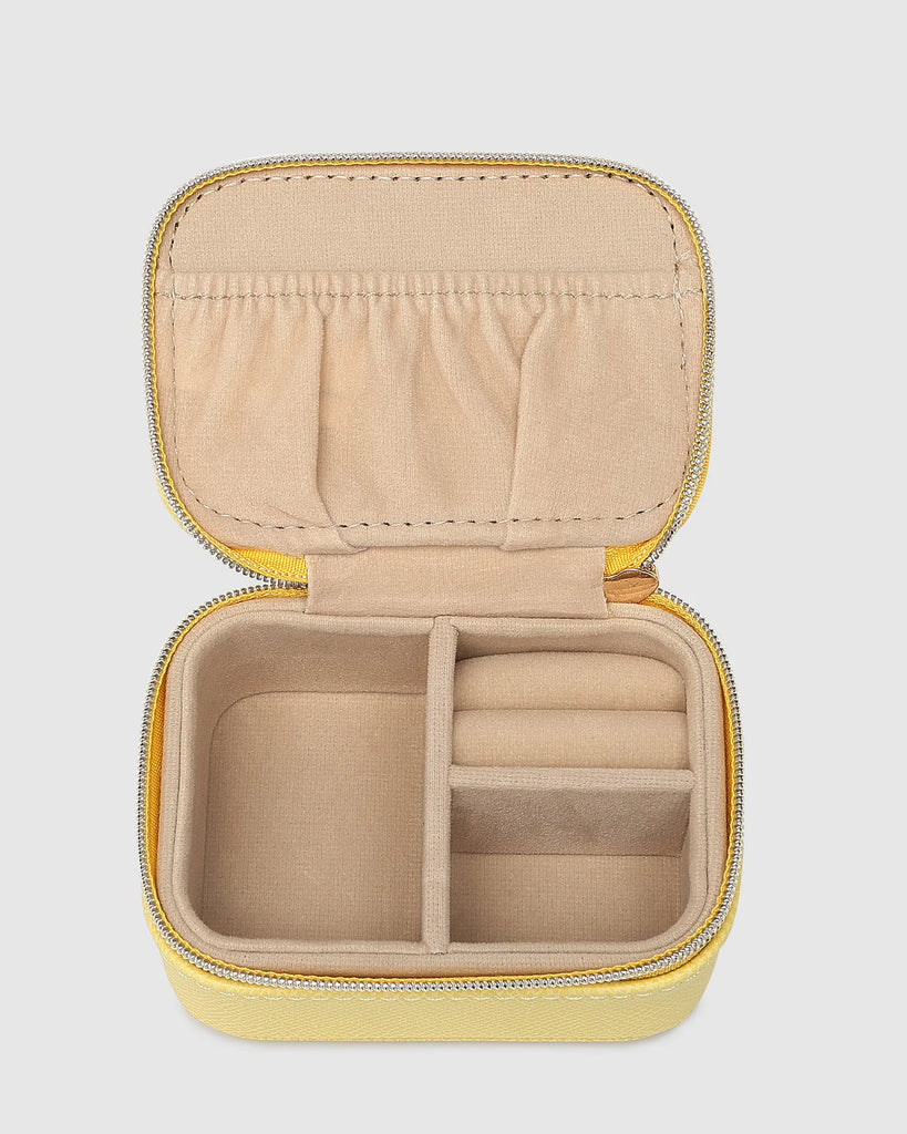 Suzie Jewellery Box - Lemon-Louenhide-The Louenhide Suzie Lemon Jewellery Box is a sweet travel companion ready to store all of your rings, necklaces, bracelets, and earrings. Use every day and stow in your bag for on-the-go use, or pack for weekend adventures. Featuring three ring rolls, two compartments, and an elasticated slip pocket, your precious gems will be secured safely. Internal Features 2 Ring Rolls, Elastic Slip Pocket, 2 Compartments Internal Lining Faux Suede 100% Lining Closure Secure Zip Bod