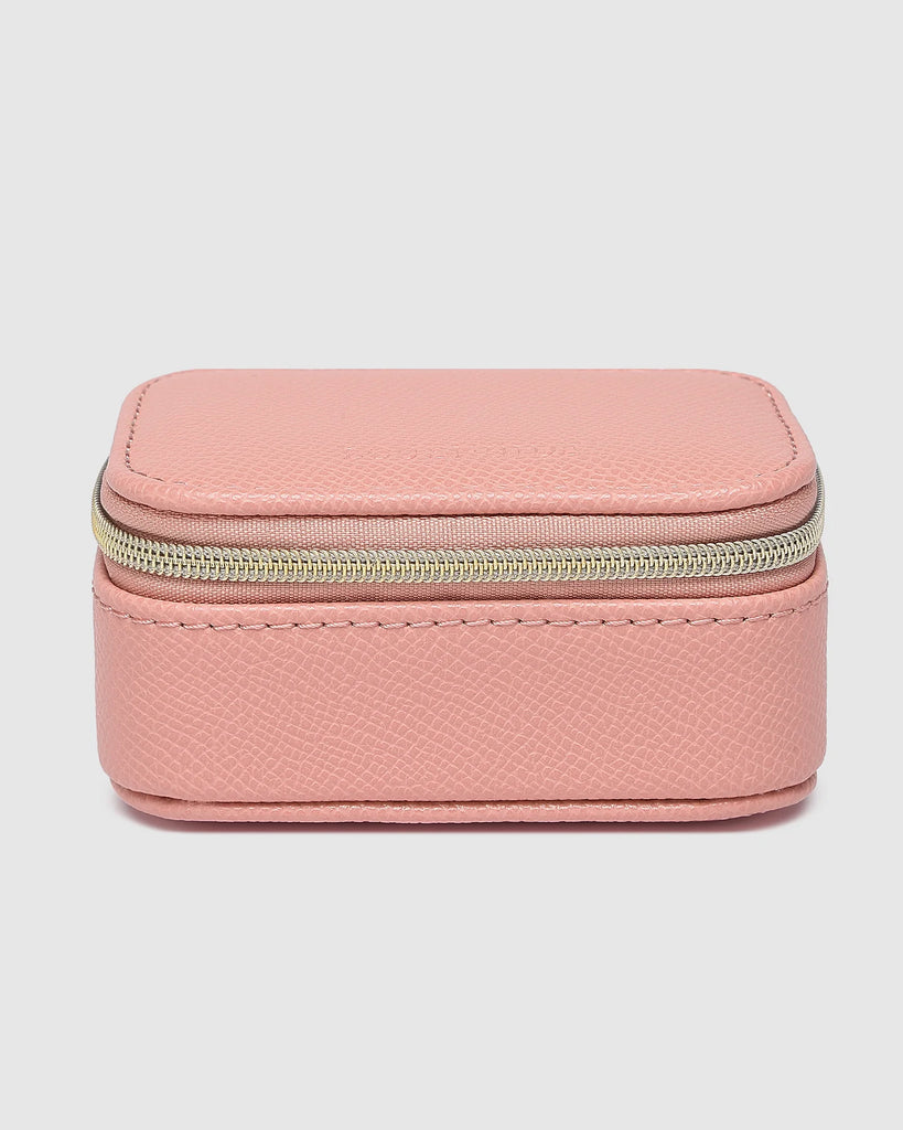 Suzie jewellery box - pink-Louenhide-The Louenhide Suzie Pink Jewellery Box is a sweet travel companion ready to store all of your rings, necklaces, bracelets, and earrings. Use every day and stow in your bag for on-the-go use, or pack for weekend adventures. Featuring three ring rolls, two compartments, and an elasticated slip pocket, your precious gems will be secured safely. Internal Features 2 Ring Rolls, Elastic Slip Pocket, 2 Compartments Internal Lining Faux Suede 100% Lining Closure Secure Zip Body