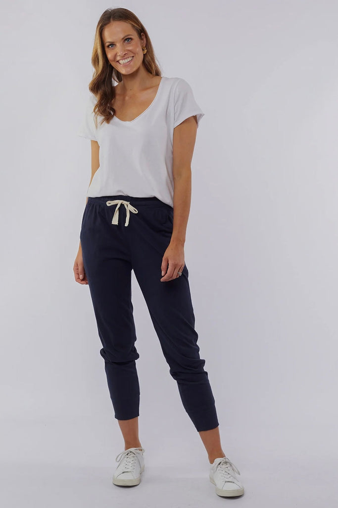 Wash out lounge pant - navy-Elm-Everybody's Favourite, The Elm Wash Out Pant Is Made In A 100% Cotton Soft Jersey Fabric And Features Deep Side Pockets And An Elastic Waist For Effortless Everyday Wear. The Dressy Trackie Thick Waistband with Cloth Drawstring Tapered Bottom Leg 100% Cotton Model is 169cm and wears Size 10-Pash + Evolve