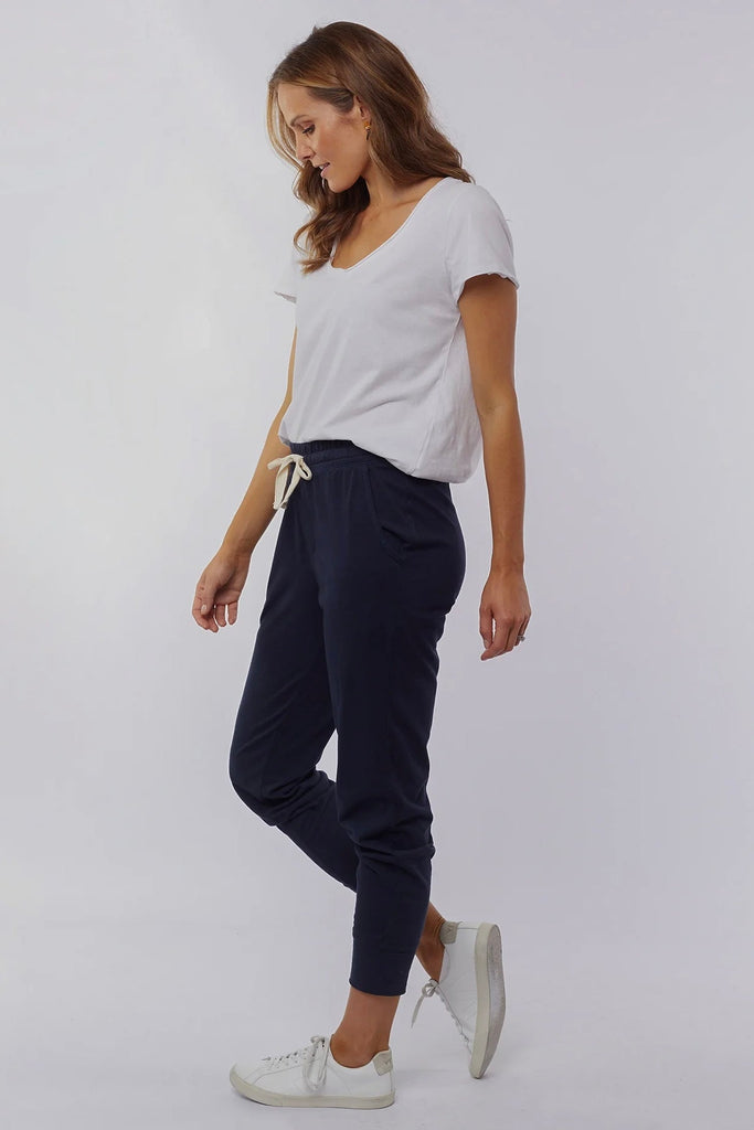Wash out lounge pant - navy-Elm-Everybody's Favourite, The Elm Wash Out Pant Is Made In A 100% Cotton Soft Jersey Fabric And Features Deep Side Pockets And An Elastic Waist For Effortless Everyday Wear. The Dressy Trackie Thick Waistband with Cloth Drawstring Tapered Bottom Leg 100% Cotton Model is 169cm and wears Size 10-Pash + Evolve
