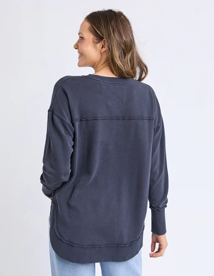 Washed Simplified Crew - Navy-Foxwood-The Washed version of our Best Selling Simplified Crew. This crew is the perfect throw over for your everyday wardrobe. With its round neck, hi-lo hemline, side splits with raw edging & the classic Foxwood logo, you are going to want one in every colour. The Washed version has a vintage look for that much-loved look from the get-go. Front chest embroidery Raw edge detail Curved hem 100% Cotton Model is wearing a Size 10-Pash + Evolve