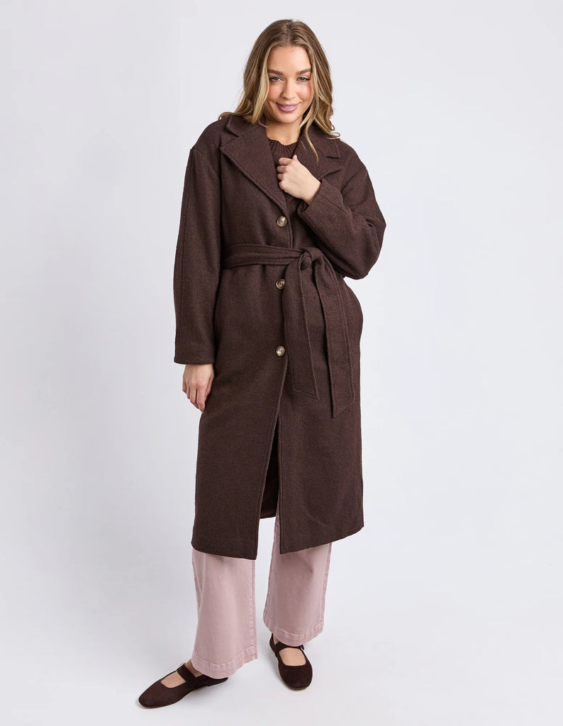Whistler Coat - Coffee Bean-Foxwood-The Whistler Coat is perfect for cooler days. With a front button opening, a waist tie for a flattering fit, and handy side pockets, it’s equal parts stylish and practical. Crafted from a warm wool-polyester blend, it’s a must-have layer for the season. Front button opening Waist tie Side pockets MAIN: 50% Wool 50% Polyester LINING: 100% Polyester Our model is 176cm and wears Size S-Pash + Evolve