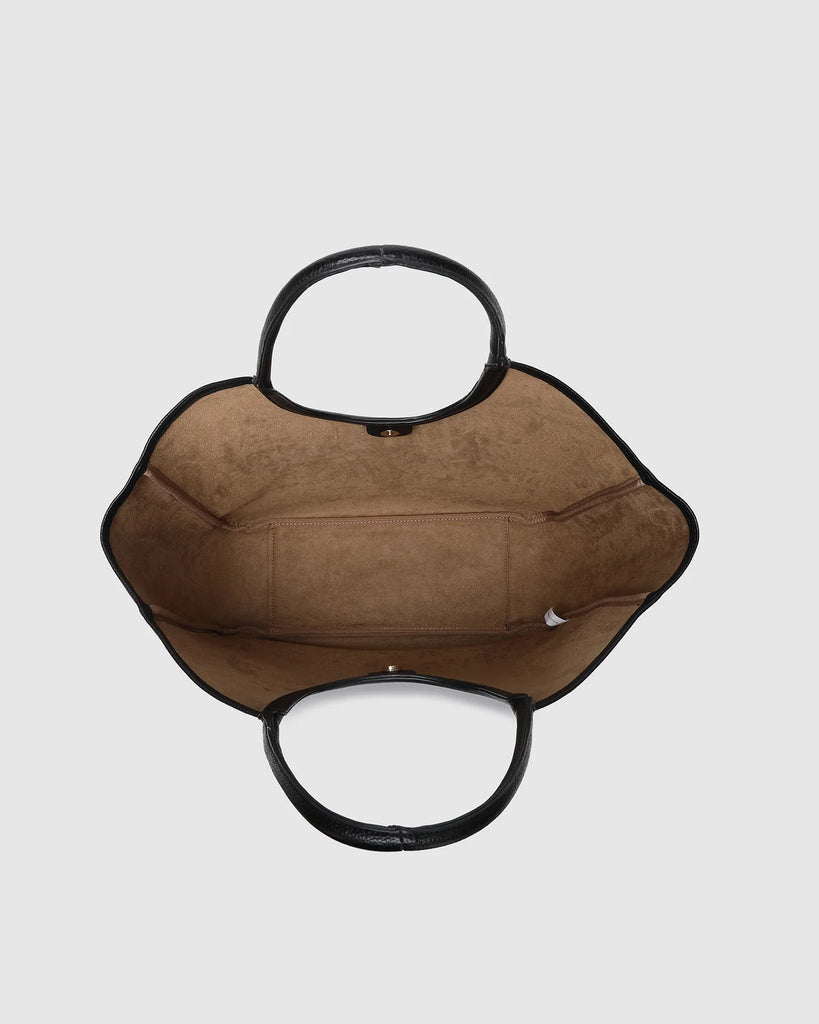 Alexandra tote bag - back-Louenhide-The Alexandra Black Tote Bag is a modern essential, thoughtfully designed to carry you from workdays to weekends with ease. This spacious everyday carryall bag balances elevated style and everyday function, making it the perfect lightweight work tote for women that also doubles as your weekend market companion. Crafted from smooth black vegan leather, she delivers a sleek, timeless finish that complements every wardrobe. Designed with a structured silhouette and vegan lea