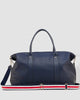 Alexis Weekender Travel Bag - Navy stripe-Louenhide-The Louenhide Alexis Navy Weekender Travel Bag with Stripe Strap is a perfect carryall for overnight or weekend adventures! Feel luxe and invest in a quality, soft, and easy clean vegan leather Louenhide travel bag. This new design is a sporty twist on a Louenhide best seller, now featuring a fun statement stripe webbing extension strap. Wide opening and spacious, this weekender is just the right size to fit your travel essentials. Carry the bag effortless