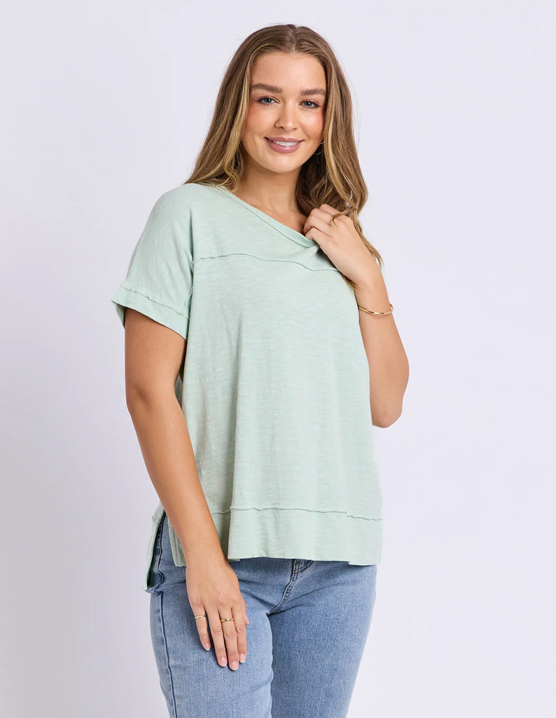 Allison Tee - Subdued Mint-Foxwood-Stay vibrant and fresh in the Allison Tee! Made from 100% cotton, this tee will keep you comfortable and stylish all day long whilst adding a pop of colour to your wardrobe. Keep it fun with the Allison Tee! Round neckline Design lines Raw edge details 100% Cotton Our model is 176cm and wears Size 10-Pash + Evolve