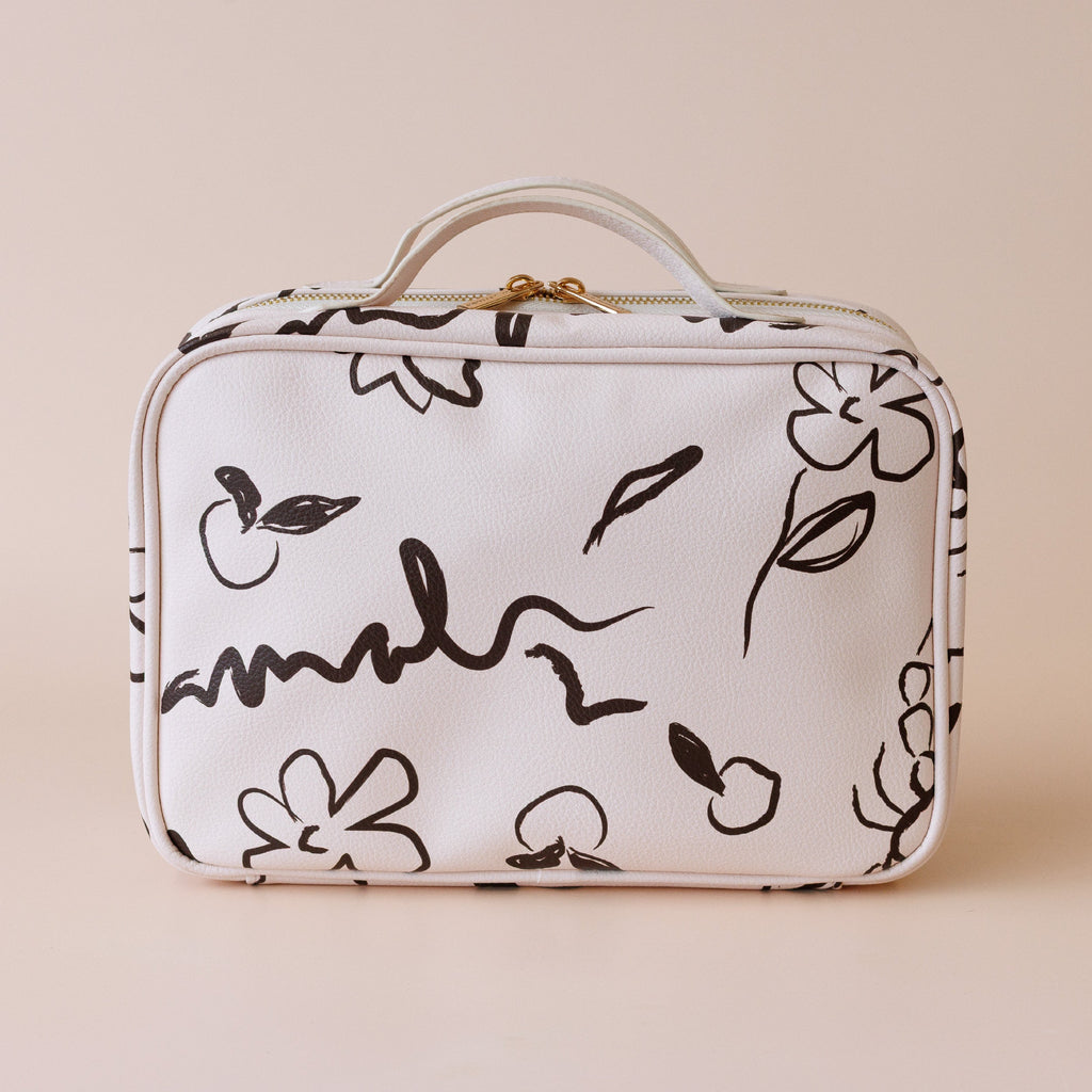 Amalfi cosmetic bag-Fox & Fallow-The bag of your dreams is here! With so many bonus features, you’ll be wondering where they’ve been all your life. The miracle pop out bag everyone’s been talking about. The ingenious removable clear bag is the true MVP here: it pops out of the main bag and it’s perfect for all your makeup & skincare essentials so you can find them easily through the clear plastic sides. Take it out and use it for your daily makeup & skincare routine or separately at airport security so you