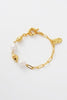 Amara Bracelet - Gold-Zarla-A refined bracelet combining soft pearls with elongated, textured links. Light-catching and softly layered, it brings an effortless, sunlit feel to your wrist. Feminine, elevated, and designed for everyday wear. *18K Gold Plated Solid Brass Base *Water proof: Can be worn in the ocean or pool-Pash + Evolve