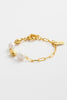 Amara Bracelet - Gold-Zarla-A refined bracelet combining soft pearls with elongated, textured links. Light-catching and softly layered, it brings an effortless, sunlit feel to your wrist. Feminine, elevated, and designed for everyday wear. *18K Gold Plated Solid Brass Base *Water proof: Can be worn in the ocean or pool-Pash + Evolve