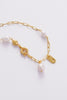 Amara Necklace - Gold-Zarla-A refined chain necklace detailed with soft pearls and textured accents. Light-catching and layered, it brings an effortless, ocean-inspired feel to your look. Feminine, elevated, and designed for everyday wear. *18K Gold Plated Solid Brass Base *Water proof: Can be worn in the ocean or pool-Pash + Evolve
