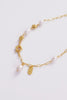 Amara Necklace - Gold-Zarla-A refined chain necklace detailed with soft pearls and textured accents. Light-catching and layered, it brings an effortless, ocean-inspired feel to your look. Feminine, elevated, and designed for everyday wear. *18K Gold Plated Solid Brass Base *Water proof: Can be worn in the ocean or pool-Pash + Evolve