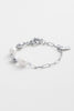 Amara bracelet - silver-Zarla-A refined bracelet combining soft pearls with elongated, textured links. Light-catching and softly layered, it brings a cool, luminous feel to your wrist. Feminine, elevated, and designed for everyday wear. *Rhodium Plated Solid Brass Base *Water proof: Can be worn in the ocean or pool-Pash + Evolve