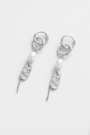 Amara drop earring - silver-Zarla-A layered drop earring combining sculptural links, soft pearls, and textured detailing. Light-catching and fluid, it brings a cool, luminous feel with an effortless, coastal edge. Feminine, elevated, and designed to stand out with ease. *Rhodium Plated Solid Brass Base *Water proof: Can be worn in the ocean or pool-Pash + Evolve