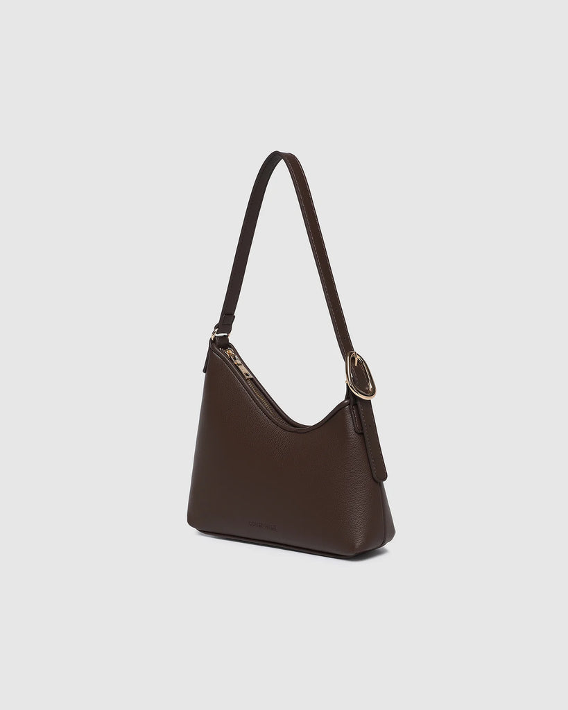 Amelia Shoulder Bag - Chocolate-Louenhide-The Amelia Chocolate Shoulder Bag is a striking addition to your collection of minimalist handbags, defined by clean lines and a distinctive, asymmetrical structured silhouette. With elevated detailing and a modern edge, Amelia offers a fresh perspective on everyday styling. Finished in smooth chocolate vegan leather and elevated with gold hardware, she adds instant polish to any look. The adjustable shoulder strap allows for a comfortable, customised fit, while the
