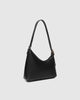 Amelia shoulder bag - black-Louenhide-The Amelia Black Shoulder Bag is a striking addition to your collection of minimalist handbags, defined by clean lines and a distinctive, asymmetrical structured silhouette. With elevated detailing and a modern edge, Amelia offers a fresh perspective on everyday styling. Finished in smooth chocolate vegan leather and accented with refined gold hardware, she brings instant polish to any look. Internal Features Zip Pocket, Slip Pocket Internal Lining Polyester Recycled B
