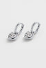 Amor Earring - Silver-Zafino-The Amor Earrings are a modern take on a classic love motif. Featuring a sparkling crystal heart charm suspended from a sleek gold huggie, these earrings bring just the right amount of shine to your everyday look. Designed in a waterproof, tarnish-resistant finish, they’re made to be worn on repeat — from day to night, beach to bar. Wear them solo for a subtle statement or style them with the Amor Necklace for a perfectly matched set. Metal: Silver Plated on BrassDimensions: 8mm