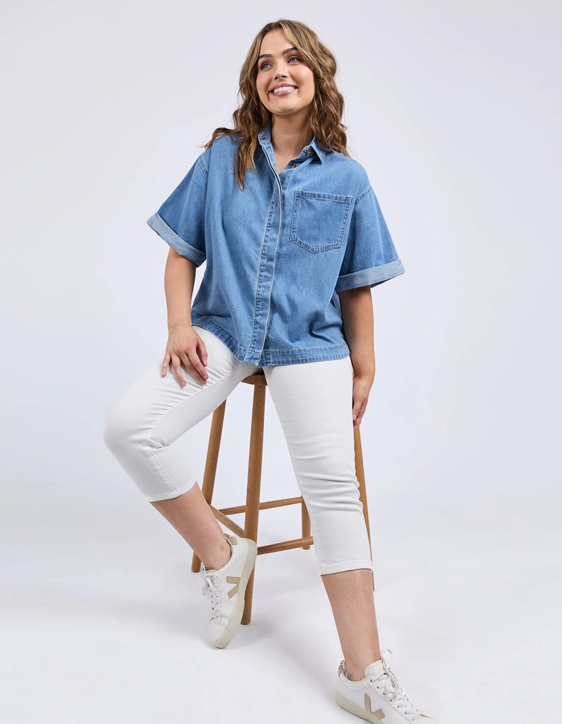 Annika denim shirt - mid blue wash-Elm-From workdays to weekends, the Anika SS Denim Shirt delivers boxy fit, turn up cuff, and concealed buttons on placket. Style it your way for an effortless look that works for any day of the week. *Boxy fit*Turn up cuff*Concealed buttons on placket-Pash + Evolve