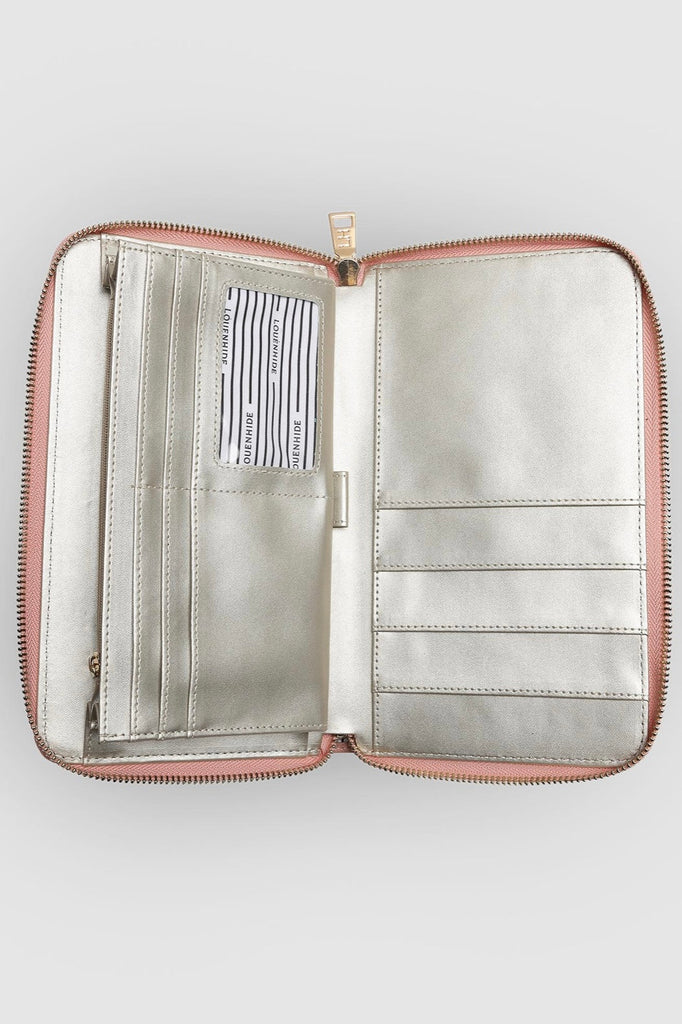 Arabella Travel Wallet - Blush Pink-Louenhide-The Louenhide Arabella Blush Pink Travel Wallet is a luxe, soft carryall wallet that is perfect for any adventure. Embark on your journeys with confidence, knowing that all your travel essentials are neatly organised and easily accessible. With thoughtfully designed compartments, our travel wallet effortlessly accommodates your passport, ID, boarding passes, and other essential documents. Everything you need is right at your fingertips. Prepare for seamless and 