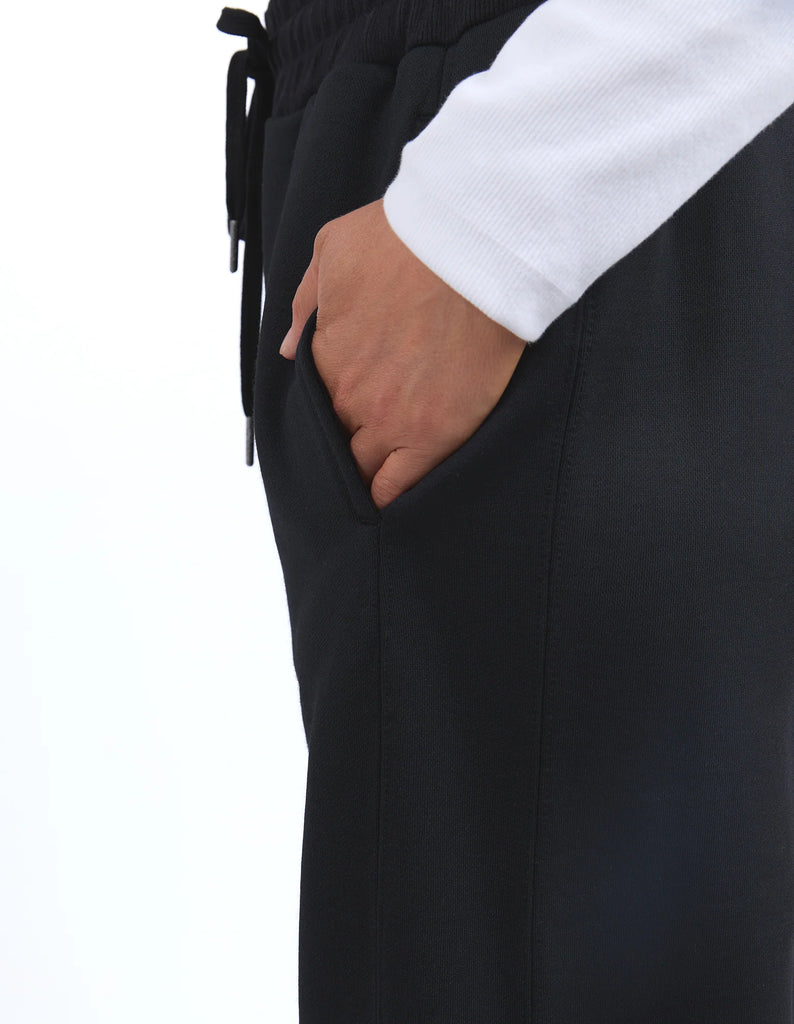 Aspen trackpant - black-Elm-Bend, stretch, run, walk. It won't matter. These track pants have a wide leg shape for those that like the extra room to move. Elastic waist Side seam pockets Wide leg slightly cropped shape polyamide cotton fleece-Pash + Evolve