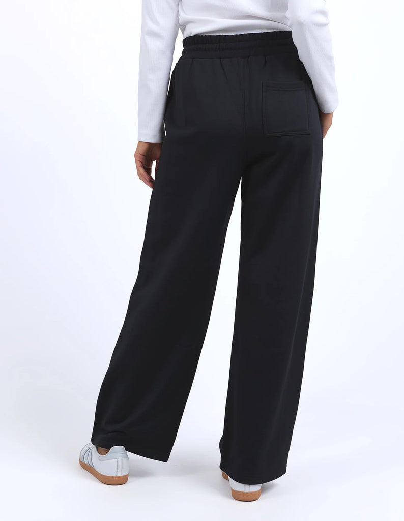 Aspen trackpant - black-Elm-Bend, stretch, run, walk. It won't matter. These track pants have a wide leg shape for those that like the extra room to move. Elastic waist Side seam pockets Wide leg slightly cropped shape polyamide cotton fleece-Pash + Evolve